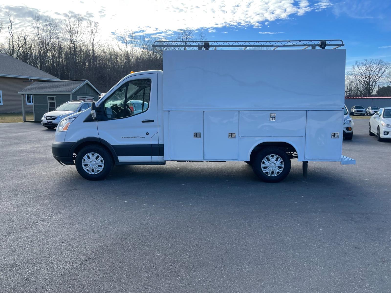2018 White /Black Ford Transit T-350 (1FDBW5PM5JK) with an 3.7L V6 DOHC 24V engine, 6 Speed Automatic transmission, located at 11115 Chardon Rd. , Chardon, OH, 44024, (440) 214-9705, 41.580246, -81.241943 - This 2018 Ford T-350 Cutaway with a utility box is a versatile commercial vehicle powered by a 3.7-liter V6 engine. It's equipped with a 4.10 gearing ratio and a limited-slip rear differential, which helps to improve traction and handling under various conditions. This model boasts substantial hauli - Photo #14